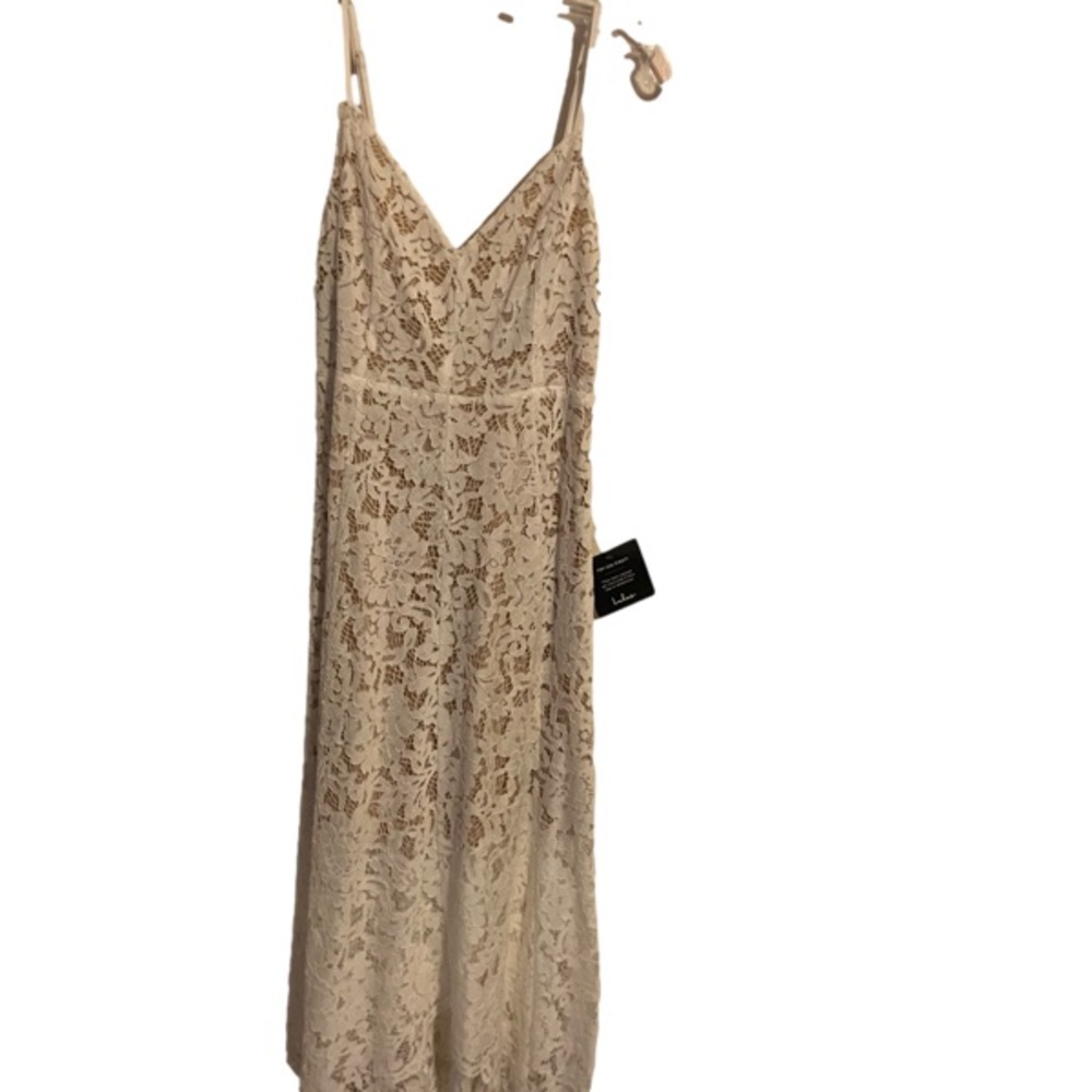 Lulus , lace dress, lined with tan body suit underneath. Brand new with tags.
